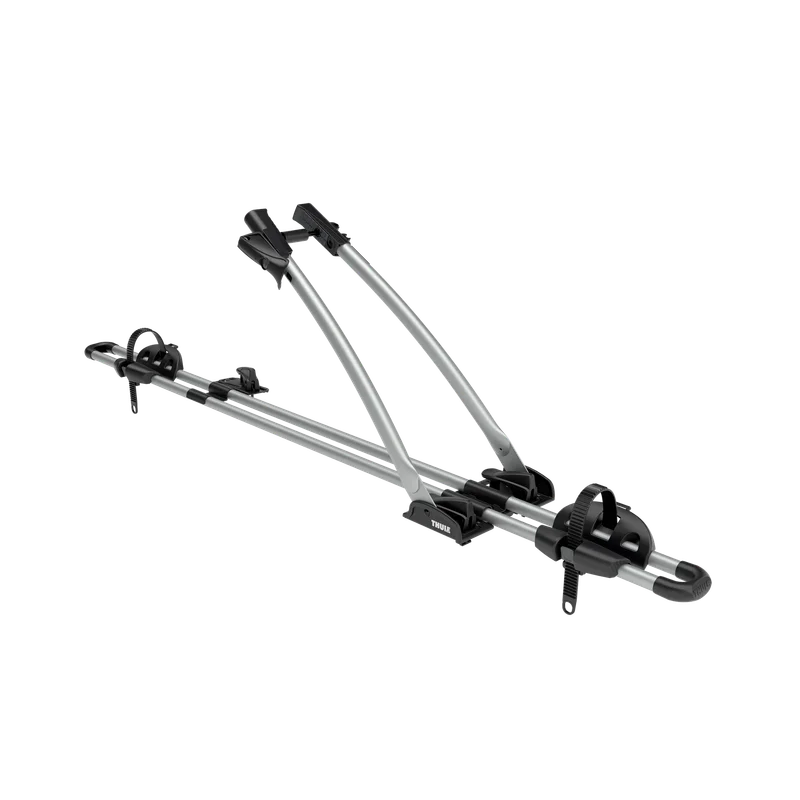 Thule FreeRide bicycle roof rack in aluminum, shown at an angle with the frame holder raised.