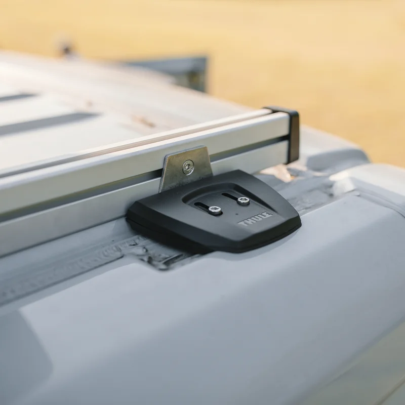 Close up of a Thule SmartClamp System van roof rack on a motorhome.