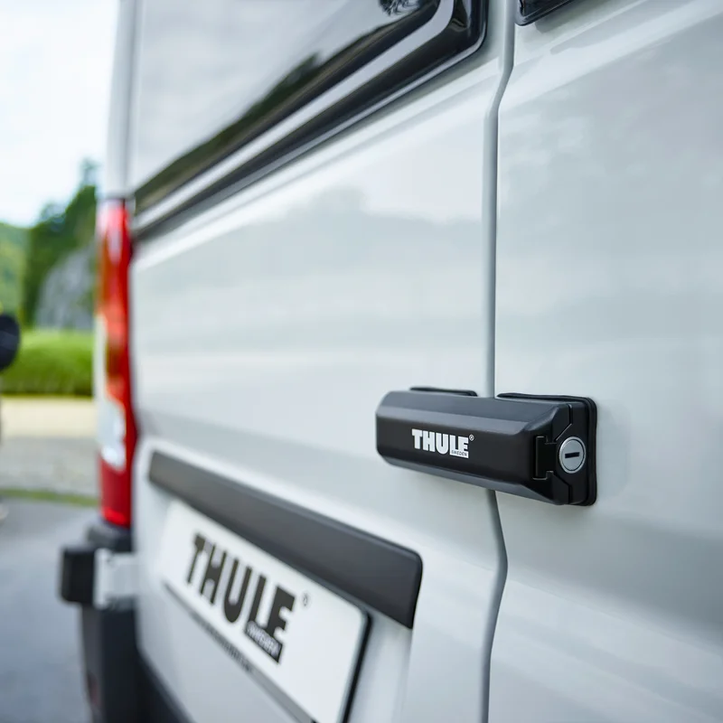 A close-up of a van with a Thule Van Lock.